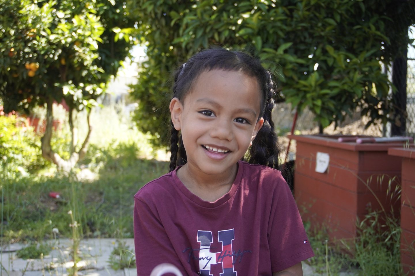 A Hope Horizon student in the community garden